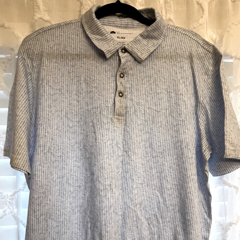 Haggar print short sleeve polo style shirt.